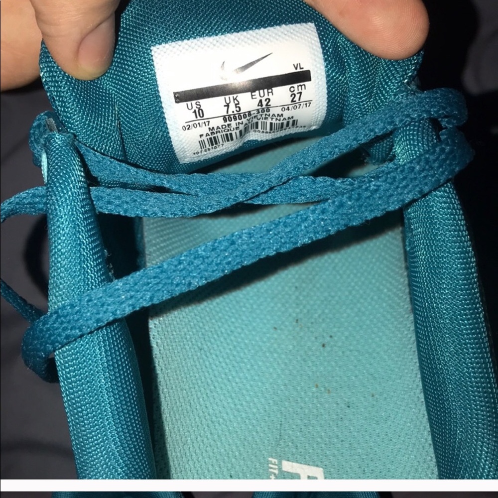 Teal women’s Nike